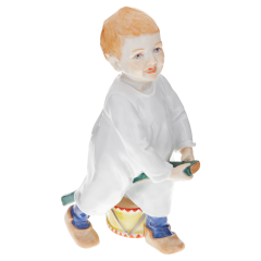 Child with drum and stick, coloured, without gold, H 18,5 cm