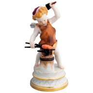 Cupid as blacksmith hammering a heart into shape, coloured, with gold, H 21 cm